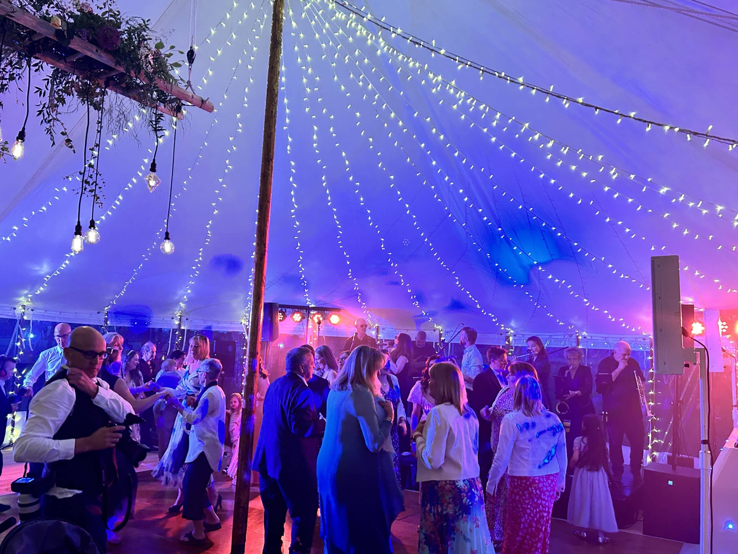 wide shot of stage and people dancing